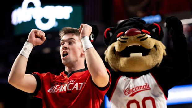 Cincinnati Bearcats cheerleader performs in the second half of the NCAA basketball game between Cincinnati Bearcats and Oklahoma Sooners at Fifth Third Arena in Cincinnati on Saturday, Jan. 20, 2024.  